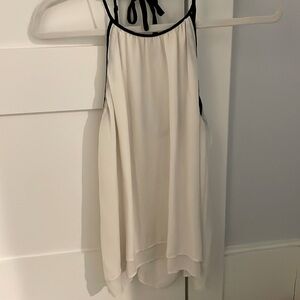 100% silk top. Great used condition.